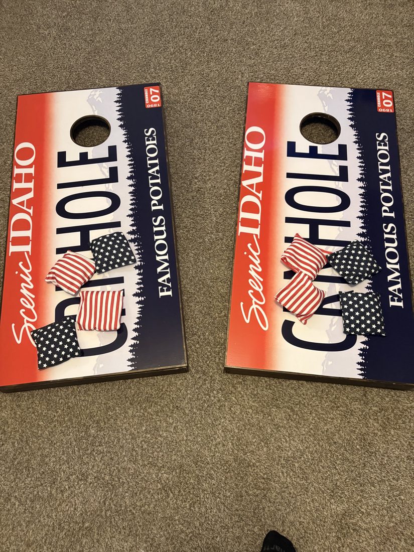 Idaho licence plate — CORNHOLE / FAMOUS POTATOES